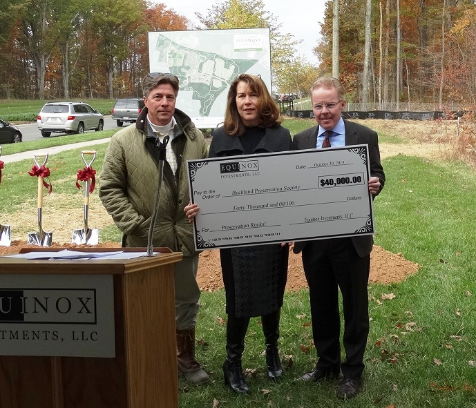 Society board members, David Blake and Linda Wright, accept a $40,000 donation to BPS preservation efforts from Scott Plein of Equinox Investments, LLC, developer of the Villages of Piedmont at Leopold’s Preserve