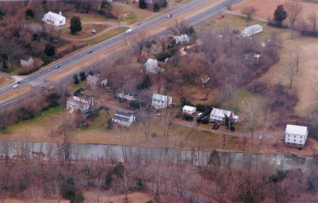 Aerial view of Buckland town includes Buckland Mill (bottom right), Buckland Church (top left) and eight of 11 historic houses.